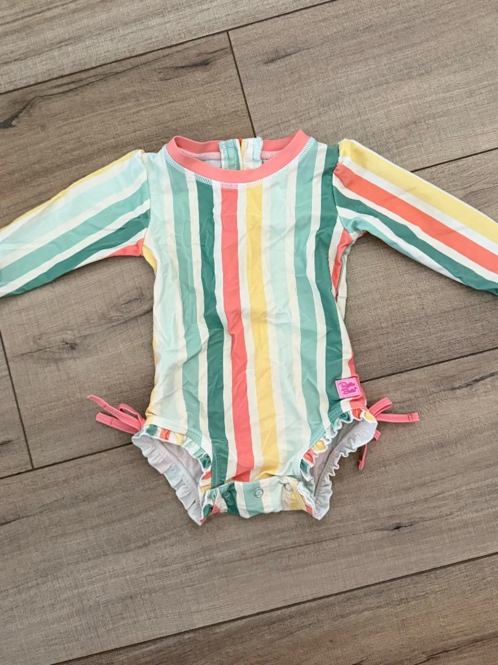 RuffleButts Striped Rashguard Swimsuit – 6-12 Months